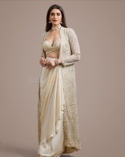 Irresistible Karishma Tanna in an Indo Western Outfit with Deep Bralette Blouse and Draped Skirt Photos 07