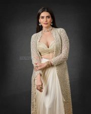 Irresistible Karishma Tanna in an Indo Western Outfit with Deep Bralette Blouse and Draped Skirt Photos 08