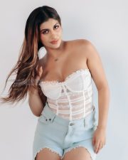 Irresistible Yashika Aannand Cleavage in a White Lace Strapless Bustier Corset Top And Blue Denim Cut Off Shorts Photos 05