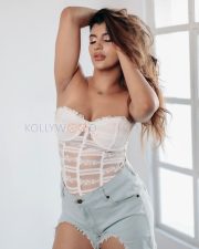 Irresistible Yashika Aannand Cleavage in a White Lace Strapless Bustier Corset Top And Blue Denim Cut Off Shorts Photos 08