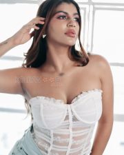 Irresistible Yashika Aannand Cleavage in a White Lace Strapless Bustier Corset Top And Blue Denim Cut Off Shorts Photos 09