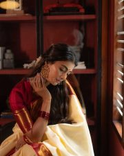 Jana Nayagan Heroine Pooja Hegde in a Classic Ivory and Gold Silk Saree with a Deep Red Blouse Pictures 04