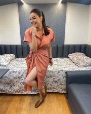 Kajal Aggarwal in a Short Pink Dress with Tie Up Photos 02