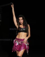 Kanchana 4 Actress Nora Fatehi in a Bold Black Leather Bralette and Sparkling Hot Pink Sequin Mini Skirt Photos 02