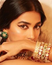 Kanchana 4 Actress Pooja Hegde in a Red and Gold Brocade Saree with a Matching Embroidered Corset Style Blouse Photos 01