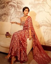 Kanchana 4 Actress Pooja Hegde in a Red and Gold Brocade Saree with a Matching Embroidered Corset Style Blouse Photos 03