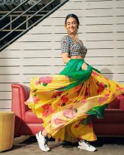 Kannivedi Heroine Keerthy Suresh in a Black and White Choli with a Flared Yellow Skirt Photos 01
