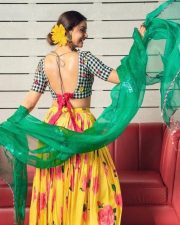 Kannivedi Heroine Keerthy Suresh in a Black and White Choli with a Flared Yellow Skirt Photos 02