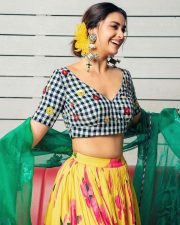 Kannivedi Heroine Keerthy Suresh in a Black and White Choli with a Flared Yellow Skirt Photos 03