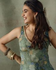 Kannivedi Heroine Keerthy Suresh in a Sleeveless Mint Green Kurta with Wide Leg Denim Trousers Photos 02