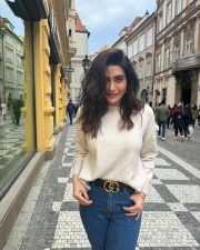 Karishma Tanna in a Light Beige Sweater and Blue Denim Photos 02