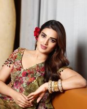 Lovely Nidhhi Agerwal in a Floral Green and Red Lehenga Photos 03