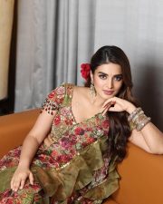 Lovely Nidhhi Agerwal in a Floral Green and Red Lehenga Photos 04