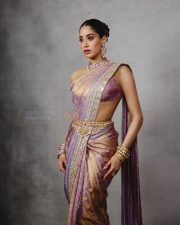 Luminous Actress Janhvi Kapoor in a Purple Gold Iridescent Sheer Saree Photos 04