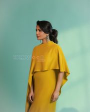 Luminous Actress Samantha Ruth Prabhu in a Mustard Yellow Cape Sleeve High Neck Midi Dress Photos 02