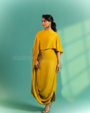 Luminous Actress Samantha Ruth Prabhu in a Mustard Yellow Cape Sleeve High Neck Midi Dress Photos 03