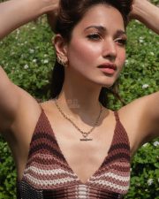 Luminous Actress Tamanna Bhatia in a Brown Striped Knit Top Photos 01