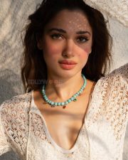 Luminous Actress Tamanna Bhatia in a White Lace Top Photos 01