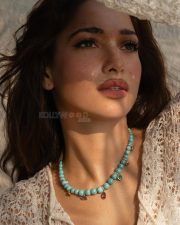 Luminous Actress Tamanna Bhatia in a White Lace Top Photos 02