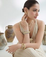 Luminous Actress Tamannaah Bhatia in a Cream knit co ord set Photos 02
