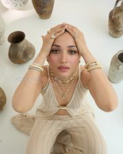 Luminous Actress Tamannaah Bhatia in a Cream knit co ord set Photos 03