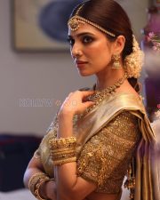 Majestic Actress Malavika Mohanan in a Gold Kanjivaram Silk Saree Photos 02