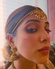 Majestic Actress Malavika Mohanan in a Gold Kanjivaram Silk Saree Photos 03