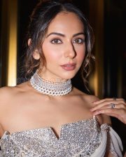 Majestic Actress Rakul Preet Singh in a White Crystal Strapless Saree Photos 06