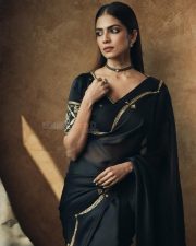 Majestic Malavika Mohanan in a Black Saree with a Gold Border and Matching Blouse with Short Blouse Pictures 03