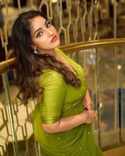 Malayalam Actress Malavika Menon in a Green Saree Pictures 04