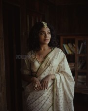 Malayalam Actress Rima Kallingal in a Traditional White Saree Photos 04