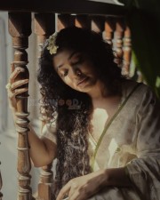 Malayalam Actress Rima Kallingal in a Traditional White Saree Photos 06
