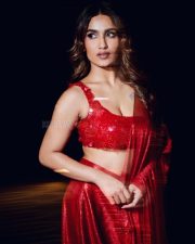 Malayalam Actress Saniya Iyappan in a Shiny Red Saree with a Sleeveless Blouse Pictures 03