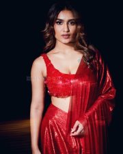 Malayalam Actress Saniya Iyappan in a Shiny Red Saree with a Sleeveless Blouse Pictures 06