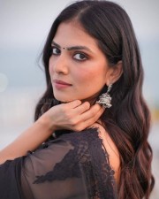 Mallu Beauty Malavika Mohanan in a Sheer Black Saree Photos 05