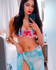 Mallu Hottie Malavika Mohanan in a Floral Bikini Pictures 02