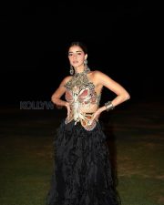 Mesmerizing Actress Ananya Panday in a Black Feathered Lehenga with Gold Butterfly Halter Photos 03