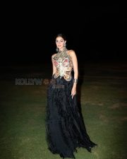 Mesmerizing Actress Ananya Panday in a Black Feathered Lehenga with Gold Butterfly Halter Photos 04