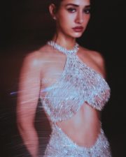 Mesmerizing Actress Disha Patani in a Silver Crystal Cut Out Mermaid Gown Photos 05