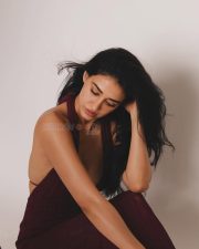 Mesmerizing Actress Disha Patani in a deep burgundy halter neck textured tank top photos 04 Mesmerizing Actress Disha Patani in a deep burgundy halter neck textured tank top photos 04