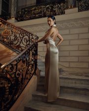 Mesmerizing Actress Esha Gupta in a Champagne Draped Satin Halter Gown Photos 04