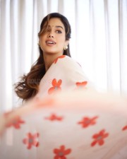 Mesmerizing Beauty Janhvi Kapoor in a White Red Floral Saree with Sleeveless Blouse Photos 02