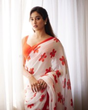 Mesmerizing Beauty Janhvi Kapoor in a White Red Floral Saree with Sleeveless Blouse Photos 04