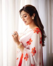 Mesmerizing Beauty Janhvi Kapoor in a White Red Floral Saree with Sleeveless Blouse Photos 07