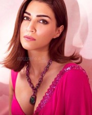 Mesmerizing Kriti Sanon in a Pink Sleeveless Georgette Sari with Plunging Bralette Photos 01