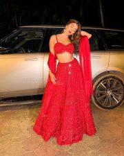 Mesmerizing Pooja Hegde in a Red Lehenga Photos 02 Mesmerizing Pooja Hegde in a Red Lehenga Photos 02