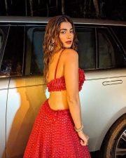 Mesmerizing Pooja Hegde in a Red Lehenga Photos 05 Mesmerizing Pooja Hegde in a Red Lehenga Photos 05