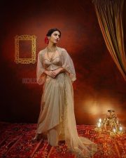 Mesmerizing Priya Prakash Varrier in a Sheer Cream Colored Traditional Low Neck Blouse with a Matching Lehenga Skirt Pictures Photos 02