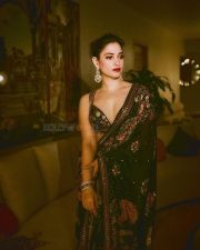 Milky Babe Tamannaah Bhatia in a Backless Black Saree at Randeep Hooda and Lin Laishram Mumbai Wedding Celebration Photos 07