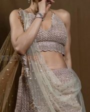 Mookuthi Amman 2 Actress Regena Cassandrra in a Rose Halter Neck Blouse with a Sparkling Embroidered Lehenga Skirt with a Sheer Dupatta Pictures 02